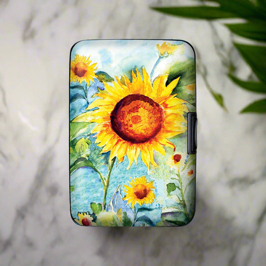 Painted Sunflower Armored Wallet featuring vibrant yellow sunflower design on aluminum exterior with RFID protection and compact organization