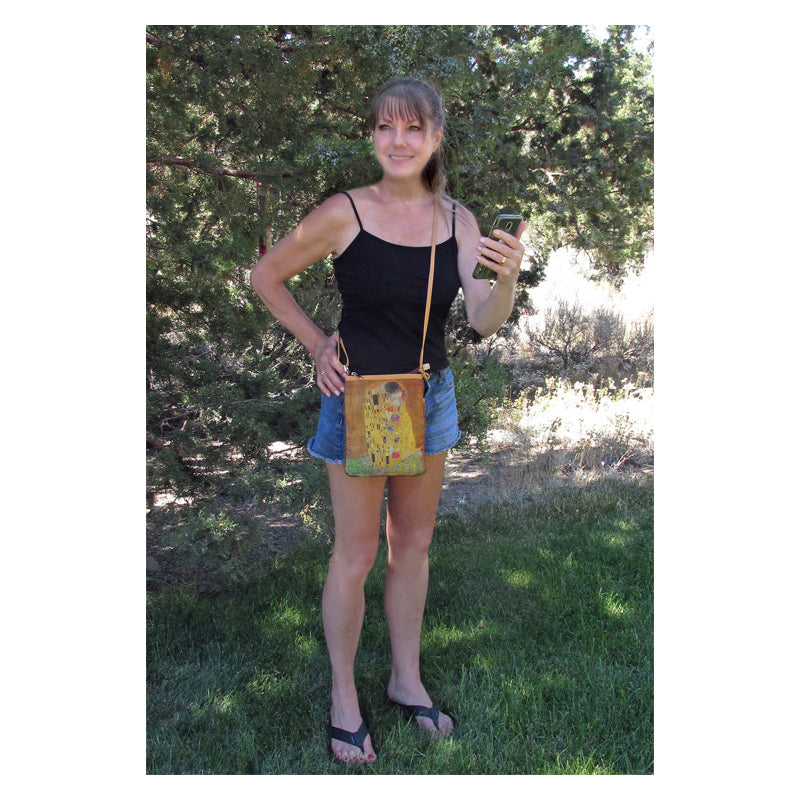 Model wearing hipster bag - The Kiss