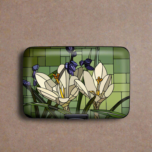 Art Glass Crocus Armored Wallet featuring luminous floral design on aluminum exterior with RFID protection and compact organization