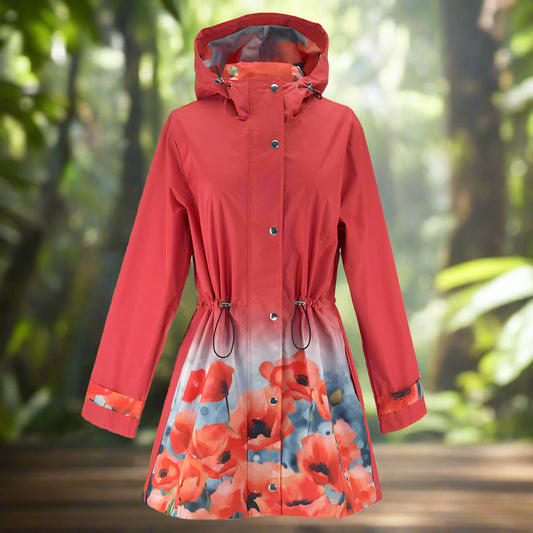 Red raincoat with poppy flower pattern on a white background