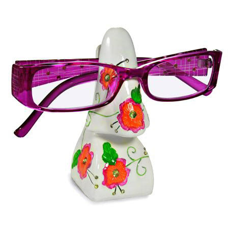 White Flower Eyeglass Stand shown holding glasses.